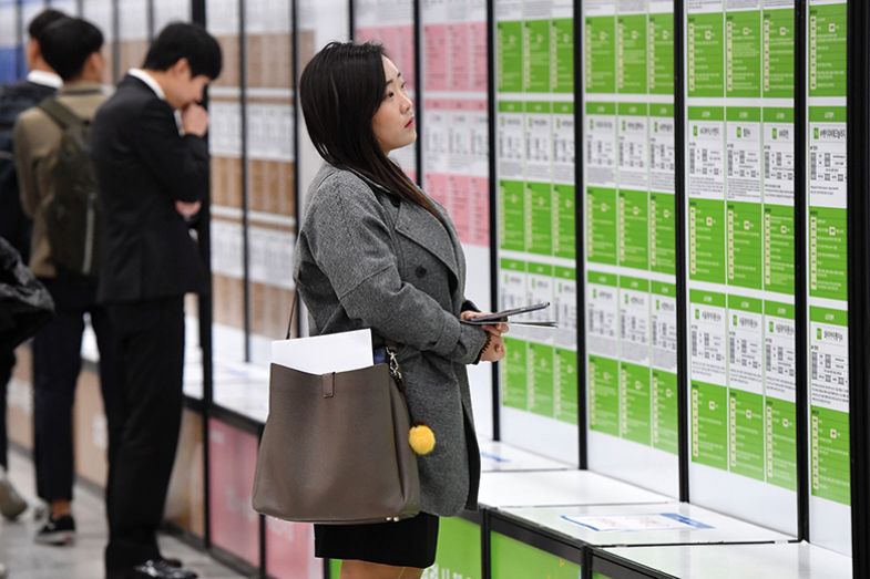 Woman looking at jobs available